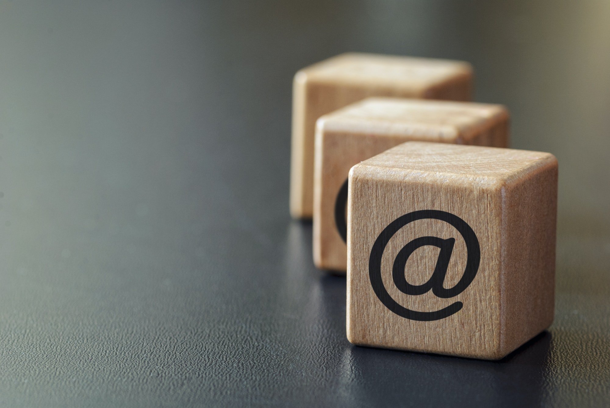 Wooden dices with internet at symbol