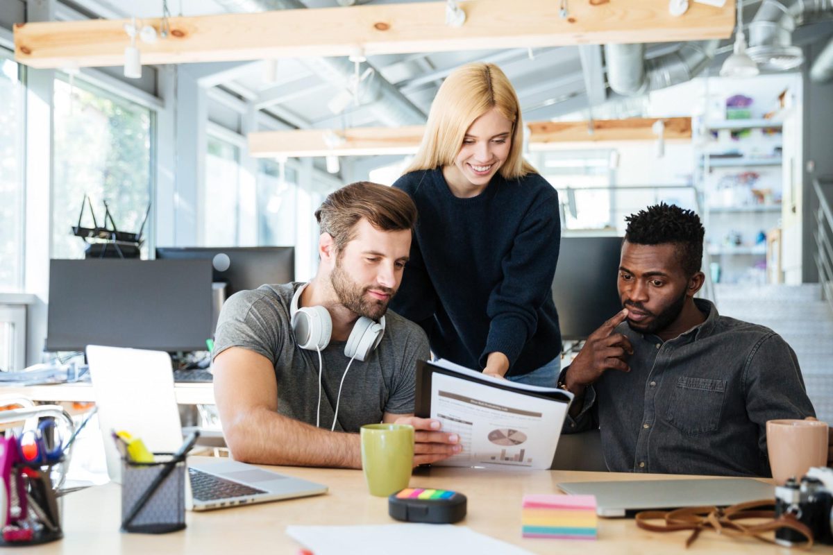 3 diverse people working together