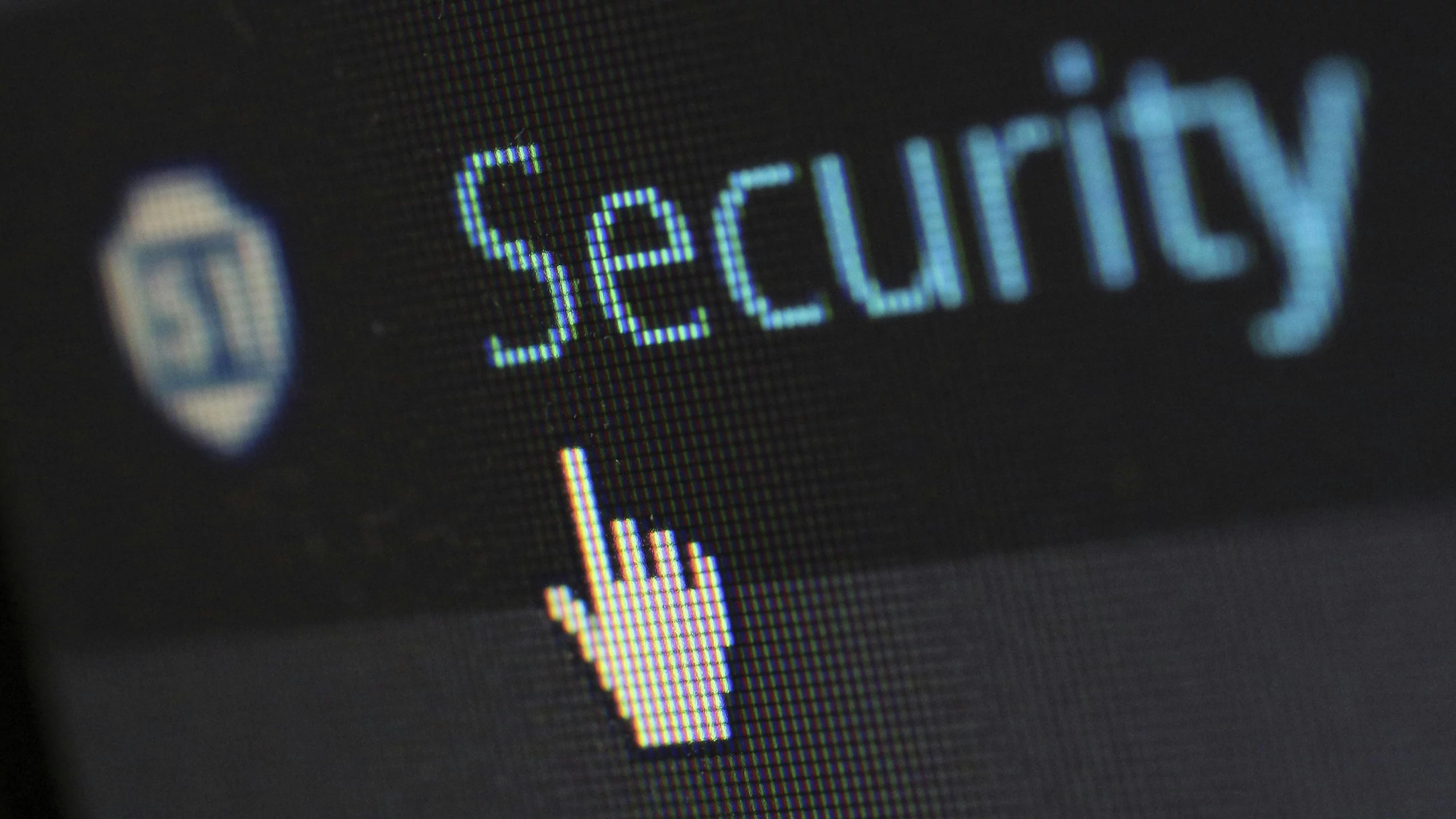 cursor pointing at a security sign